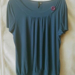 Short sleeve blue blouse with button accent